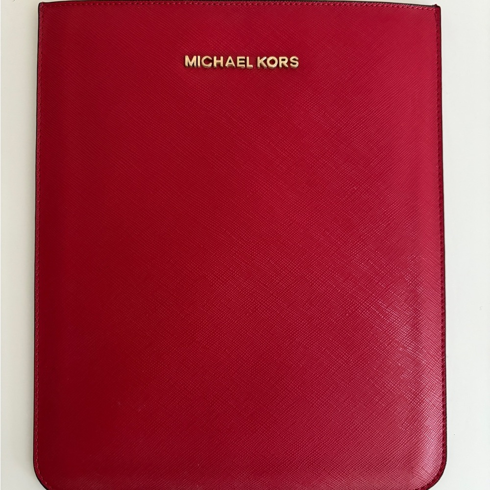 Michael Kors case for the IPad mini. 
Only used once or twice. 
8” X 6 1/4”